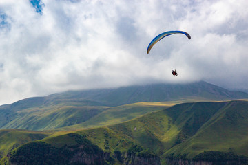 Paragliding in Gudauri Recreational Area in the Greater Caucasus mountains