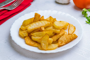 The potatoes wedges on a plate