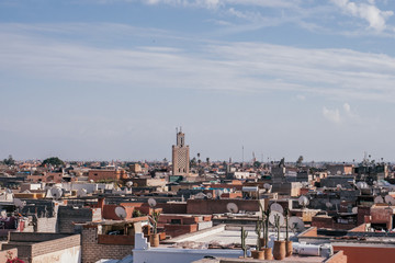 Fototapeta premium A beautiful view of Marrakech from a rooftop in the middle of the famous moroccan city.
