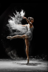 Fototapeta na wymiar young dancing girl ballerina