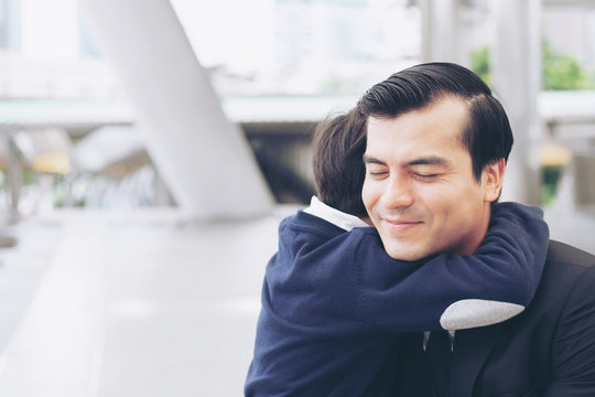 Father single dad and son fill happy Hugging son on business district urban, Dad and Son happiness family concept