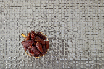 Palm Dates on silver floor