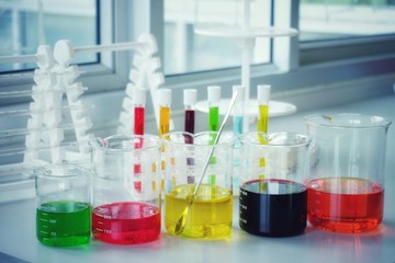 Chemical tube set development and pharmacy in laboratory  with multicolored substances in laboratory - Image