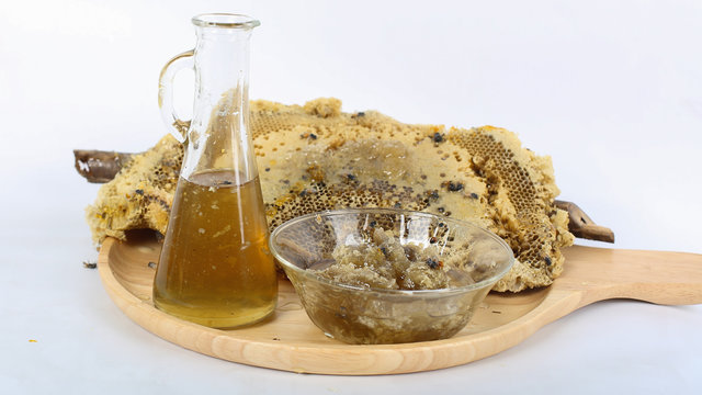 a bunch of bees on the nest make honey