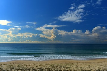 Australian Coastline Diamond Beach summer beach scene with storm clouds on horizon