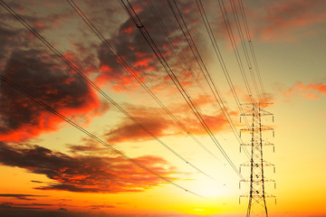 High voltage tower with sky sunset.