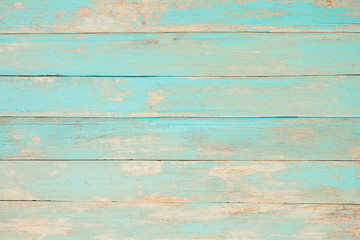 Vintage beach wood background - Old weathered wooden plank painted in turquoise blue pastel color.