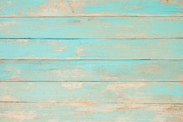 Vintage beach wood background - Old weathered wooden plank painted in turquoise blue pastel color.