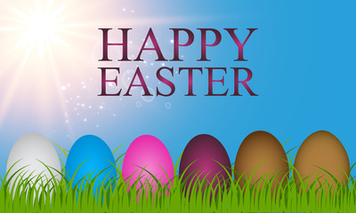 Easter eggs on the green grass. Seasonal holidays in April. Colorful egg and flowers.Banner