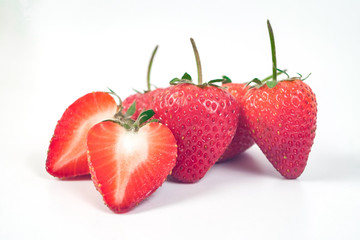 Group of Strawberries on white background.