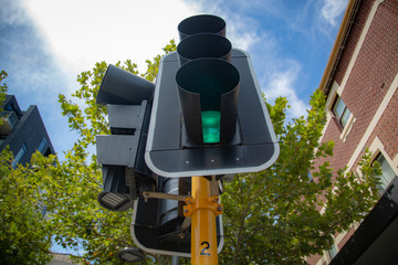 railroad crossing green light sign