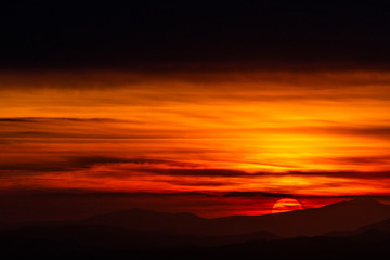 Fototapeta na wymiar Beautiful sunset over mountains layers in Umbria (Italy)