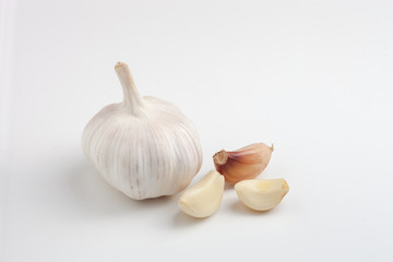 Image of fresh head of garlic isolated on white background. Vegetables. Spices. Food.