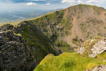 Fototapeta na wymiar View from Mount Snowdon, Snowdonia, Gwynedd, Wales, UK - looking north at Garnedd Ugain, the Pyg Track and the Miner's Track