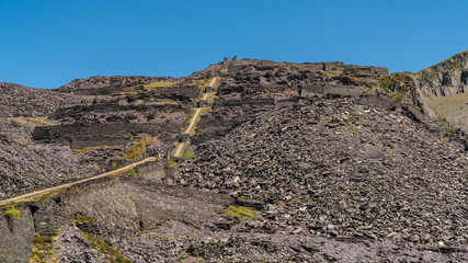 Walking in the derelict Dinorwic Quarry near Llanberis, Gwynedd, Wales, UK