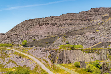 Walking in the derelict Dinorwic Quarry near Llanberis, Gwynedd, Wales, UK