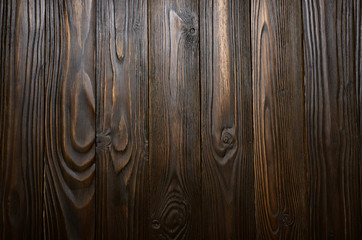 Natural dark wooden textured background of flat layed planks with weathered vintage oiled surface