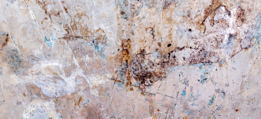 Vintage painted billboard with old torn paper posters stickers background