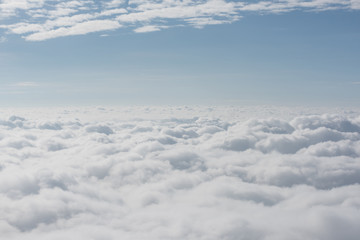 cloud and sky view from window of airplane