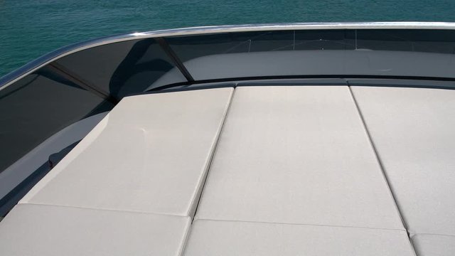 Sunbathing area on the upper deck of a luxury yacht.