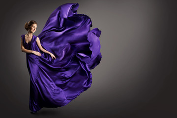 Woman Purple Dress, Fashion Model in Long Silk Gown Waving Cloth on Wind, Fantasy Girl in Flying...