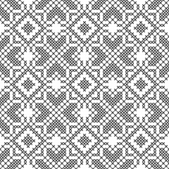 Fototapeta premium Cross stitch. Black and white seamless pattern. Embroidery, knitting. Abstract geometric background. Ethnic ornaments.