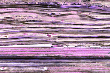 Old wooden purple door grunge texture.