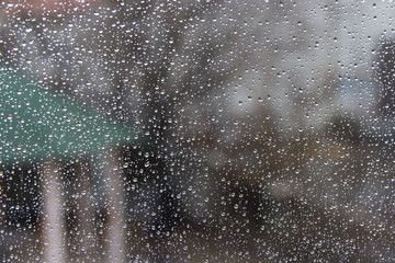 Water droplets on rainy winter windows