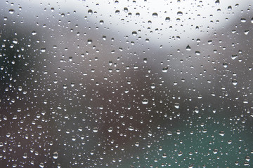 Water droplets on rainy winter windows