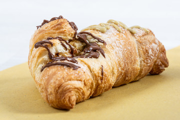 Stuffed brioche on a wooden table