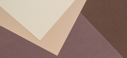 Color papers geometry composition banner background with beige and brown color tones