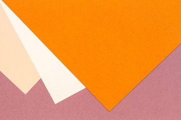 Color papers geometry composition background with beige orange and brown color tones