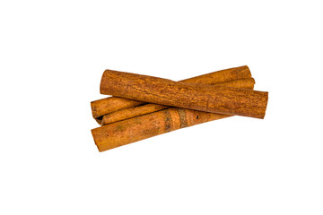 Brown cinnamon sticks isolated on a white background