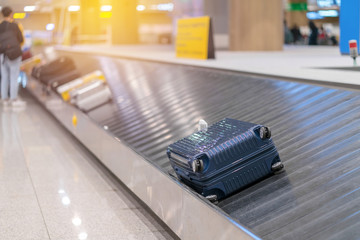 Suitcase or luggage with conveyor belt in the airport