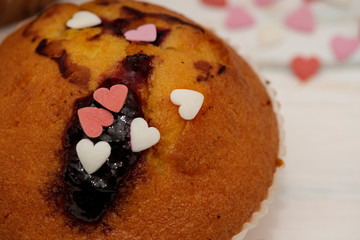 Blueberries muffins or cupcakes on white texture