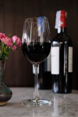 two glasses of red wine on table