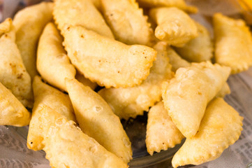 Closeup shot of gujiya , sweet filled delicacy served on holi and diwali