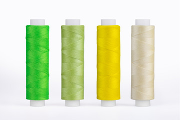 Set of sewing thread coils, miscellaneous colours, isolated on white