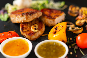 Roasted fresh vegetables served with grilled pork