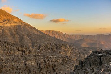 Geological landscape of Jabal Jais characterised by dry and rocky mountains, Mud Mountains in Ras...