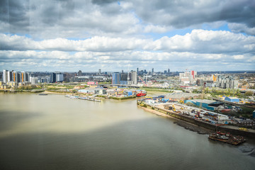 Fototapeta na wymiar Aerial view of East London and Excel redevelopment from Emirates cable car.