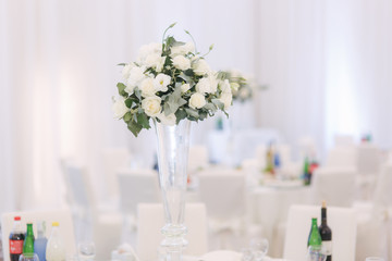 Wedding bouquet in restaurant on the table