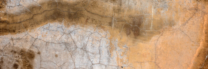 Dark painted plaster wall with dirty cracked scratched background. Old retro vintage brickwall with peel stucco texture