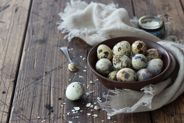 Boiled quail eggs on a wooden table