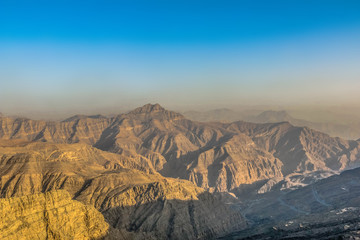 Geological landscape of Jabal Jais characterised by dry and rocky mountains, Mud Mountains in Ras Al Khaimah, United Arab Emirates