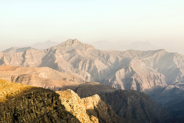 Geological landscape of Jabal Jais characterised by dry and rocky mountains, Mud Mountains in Ras...