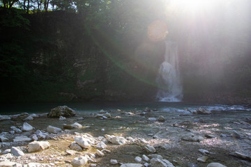 Obraz premium waterfall at sunset