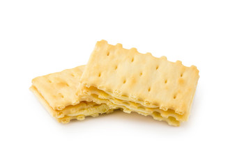 Cracker with creamy layer isolated on white background