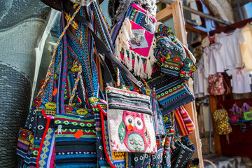 Handmade traditional , colorful bags on the gift shop.