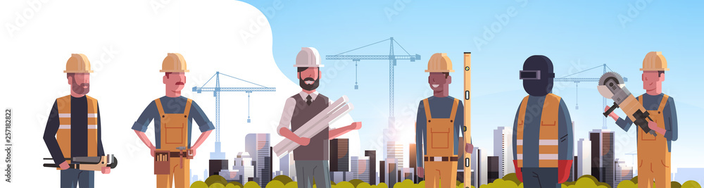 Wall mural construction workers team industrial technicians builders group over city construction site tower cr